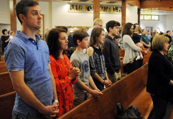 The Babinchak family, parishioners of St. Joseph the Worker pray for an increase in vocations to the religious life and the priesthood. From left are Steve and Jean Babinchak and their children Zach, Emily and Stephen.