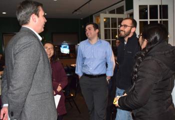 Dr. Rombeiro chats with, from left, Tina Tran, John Pellosie, Andrew Ivankovits and Isaaca Lee.